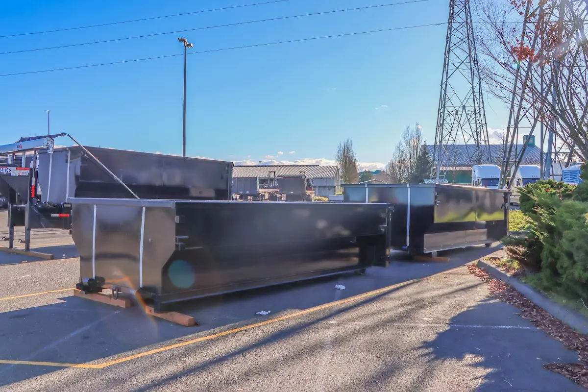 Roll-off dumpster ready for waste disposal at job site for 4 Yard Dumpster Rental in Southbridge Town